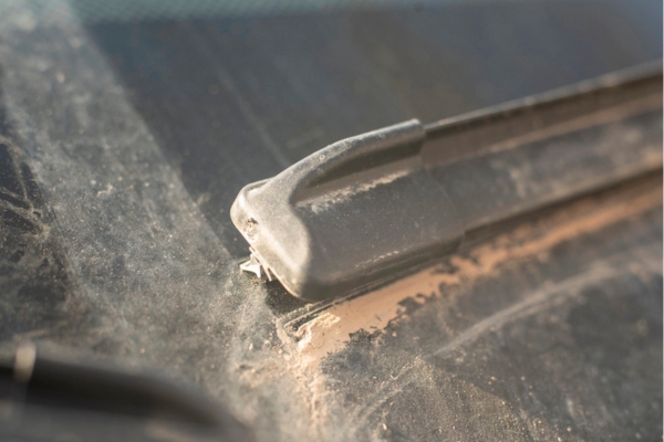 sand on windshield under the wiper