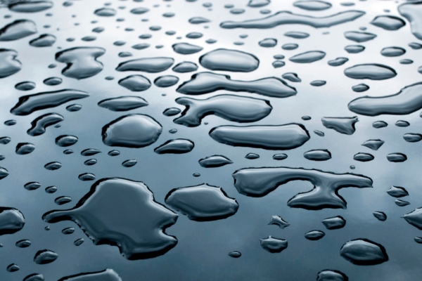 hard water drops on a car's surface