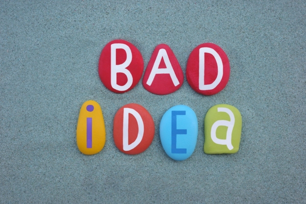 bad idea spelled using colored clay with letters depicting DIY car glass repair kits