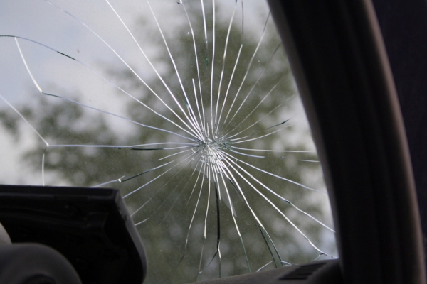 close up of a broken car glass