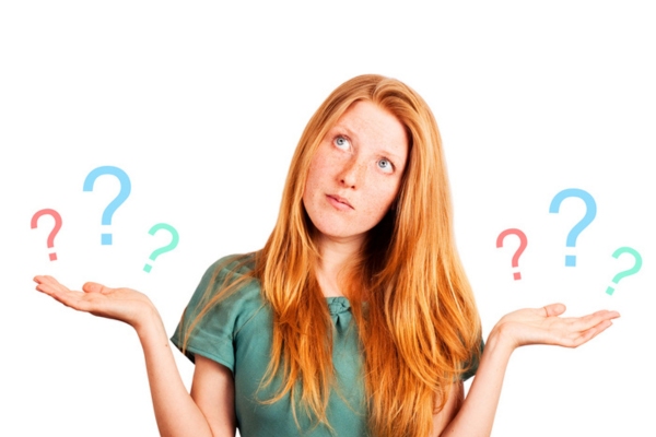 woman with hands open on each side with question marks depicting choosing the right auto glass service provider