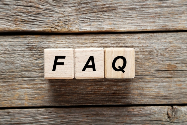 FAQ spelled using wooden letter cubes depicting questions about Windshield Crack in Cold Weather