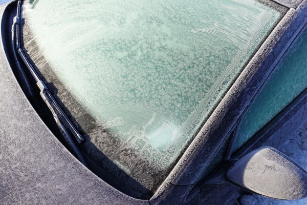 Frozen car windshield on winter time