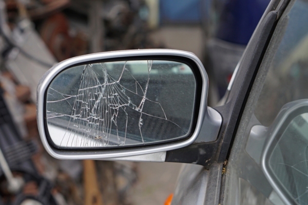 cracked side mirror of a car
