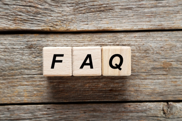 FAQ spelled using wooden letter cubes depicting Summer Weather Windshield Care