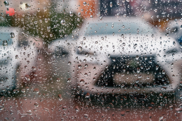 view inside a parked car during rain