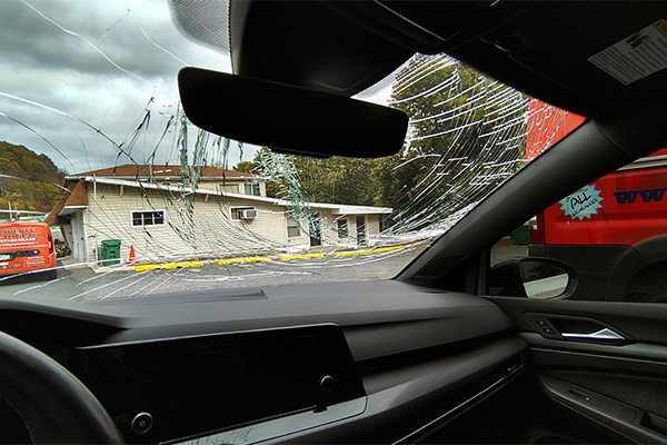 Ebervale, PA cracked windshield inside a vehicle with service area visible outside